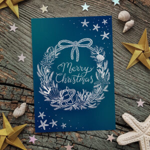 Coastal wreath Christmas card featuring a variety of beautiful oceanic fauna and flora.