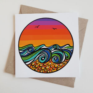 'Sunset Waves' art greetings card featuring waves under a vibrant, sunset sky. Inspired by Chesil Beach on the Isle of Portland, Dorset.
